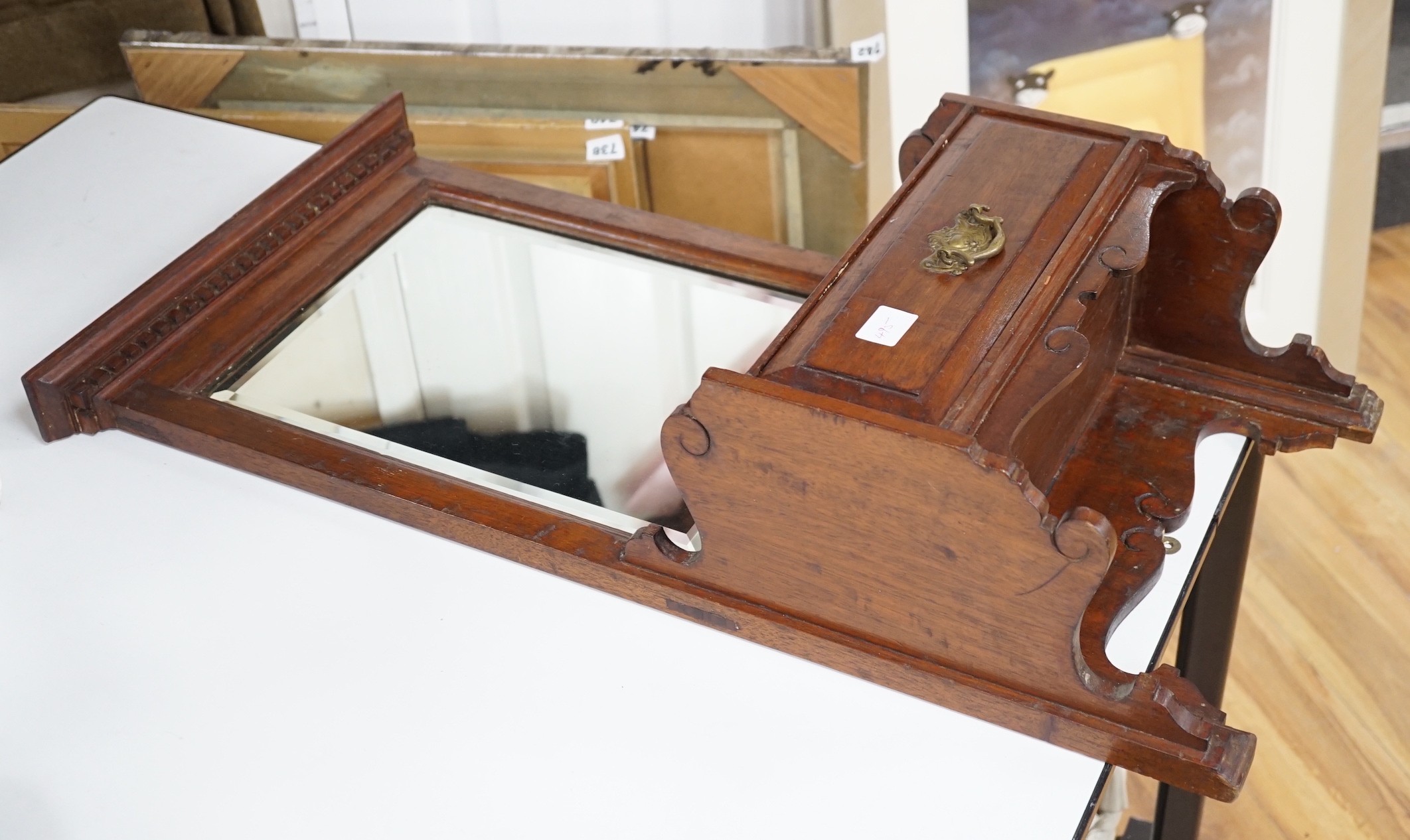 A Victorian walnut single drawer hanging mirror, 77cms high